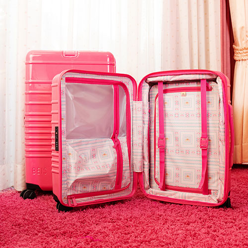 The Carry-On Roller in Barbie? Pink